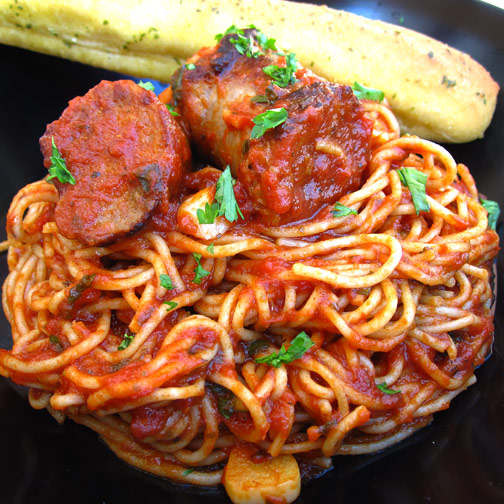 Sausage with Tomatoes and Garlic on Spaghetti