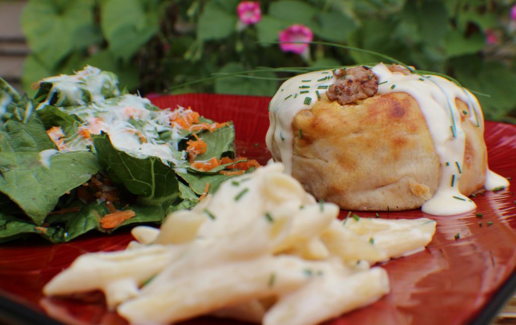 Cornmeal Encrusted Sausage & Potato Knishes with Smoked Gouda Sauce