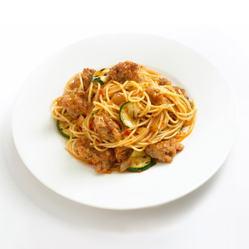 spaghetti with Premio pesto chicken sausage and zucchini