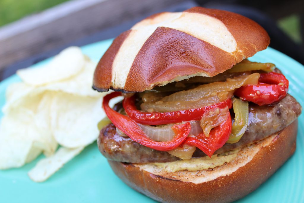 Beer Braised Brats on Pretzel Buns