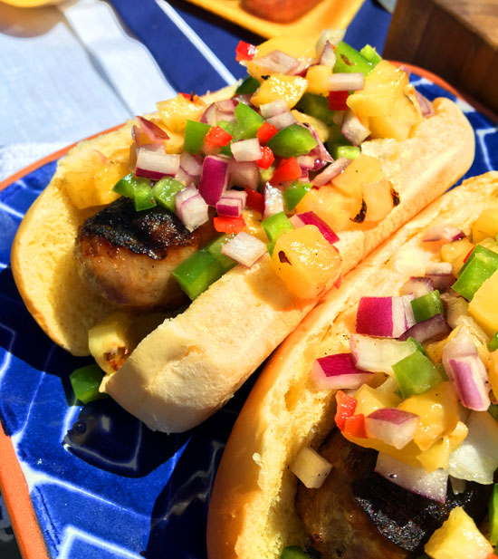 Top your Premio sausage hoagies with Chef Capon's diced pineapple and jalapeno relish