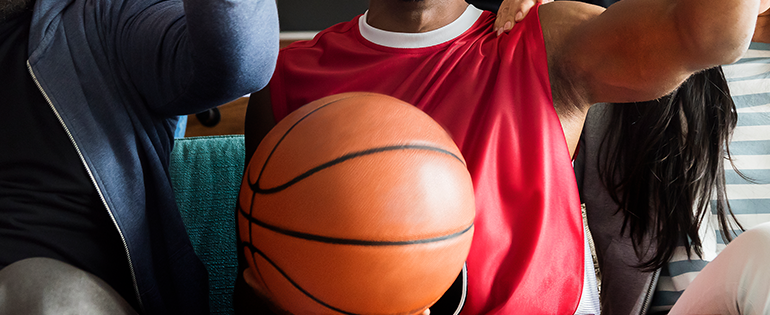 man holding basketball