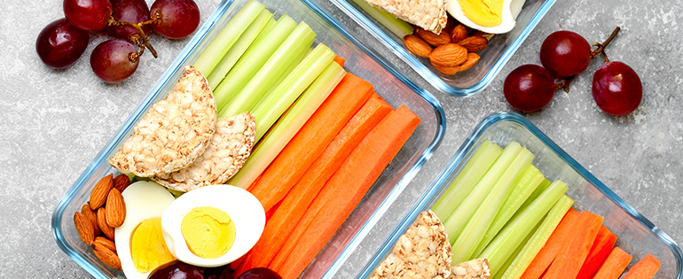 healthy lunches with carrots, eggs, almonds, celery and grapes