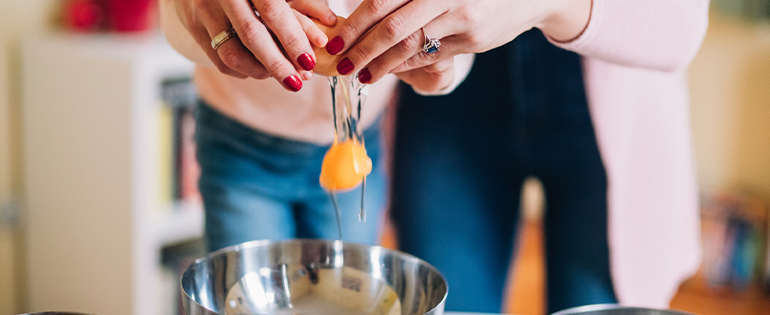 Cracking Egg in Bowl