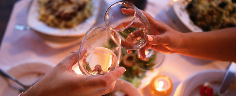 People Cheersing Wine Glasses