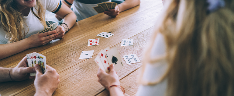 People Playing Card Game