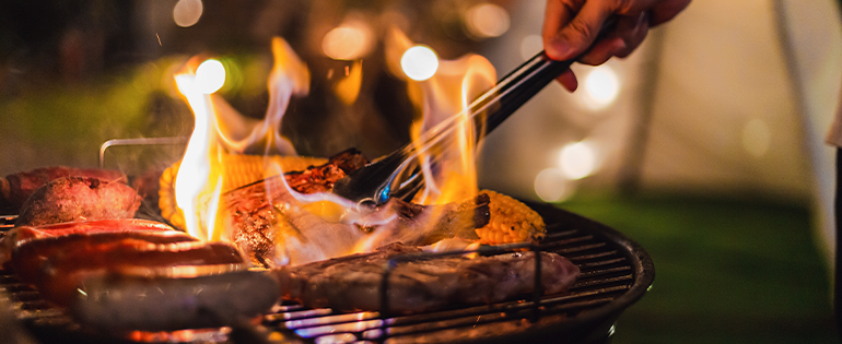 cooking meat on grill