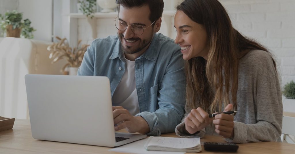 couple looking at computer