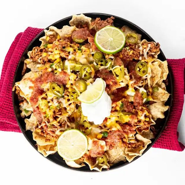 Ground Pork Taco Nachos in a bow with chilli by Premio