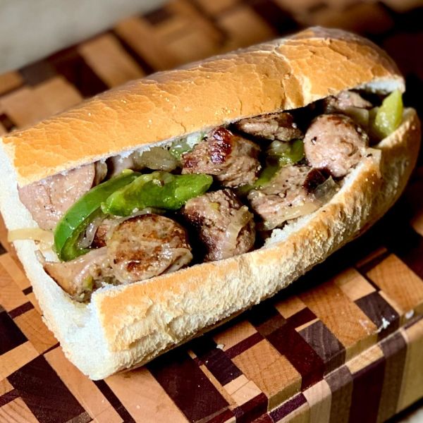 A delicious hero roll stuffed with Premio real Italian sausage and peppers