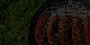 Sausages cooking on a grill
