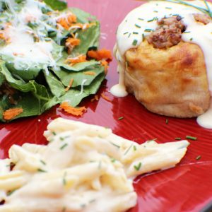 Cornmeal Encrusted Sausage and Potato Knishes with Smoked Gouda Sauce